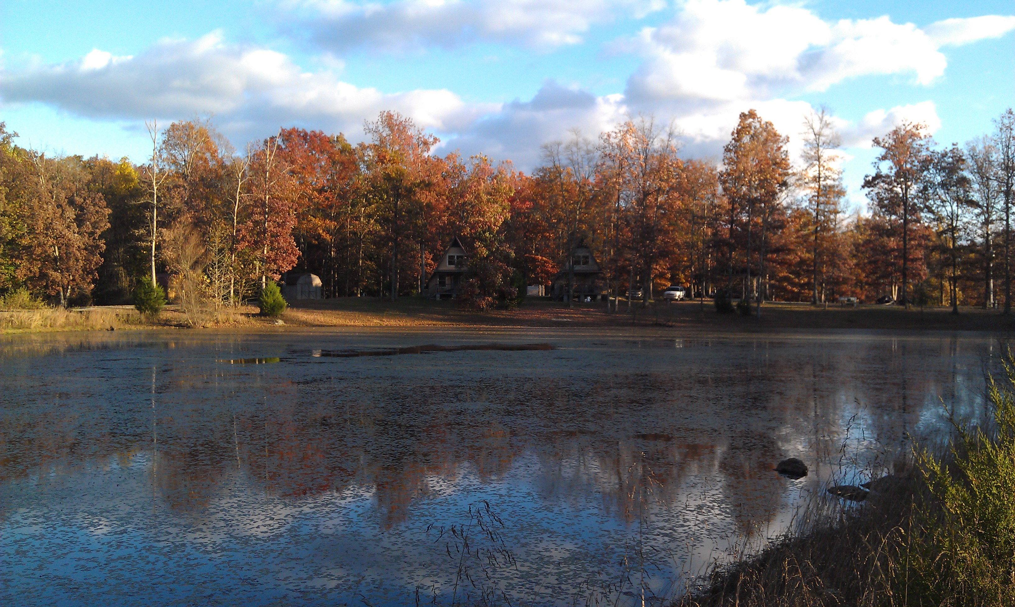 Campground in Autumn from across pond